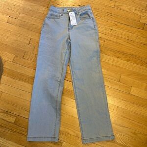 Women’s jeans, size 4. Mid waisted, stretchy jeans